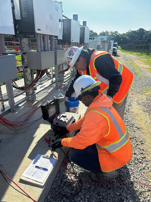 Marco Encinas, a journeyperson electrician, mentors apprentice Gabriel Soptchigoum on a job site in Maryland. Got Electric’s hands-on apprenticeship program helps build local talent to address the growing shortage of skilled electricians across the region.