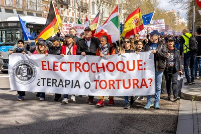 Protesters stood in front of the 33rd European Congress of Psychiatry to denounce coercive, nonconsensual psychiatric practices.
