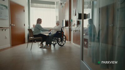 Parkview team member comforts a patient.