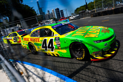 The number 44 car of NASCAR driver, Brennan Poole, races on the streets of Chicago wrapped with Toxic Waste Sour Candy iconography