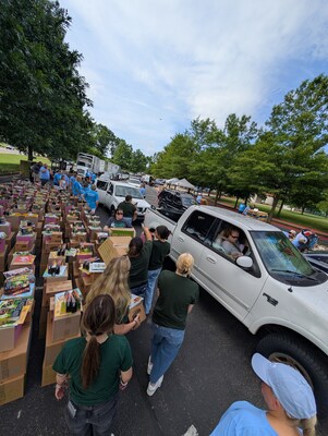 StarKist staff and volunteers distributing kits filled with StarKist protein, shelf-stable food, hygiene items, and resources to support families experiencing food insecurity during the summer months.