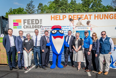 (Credit: Chip McCrea) Left to right: Brian Han, Director of International Business Investment at Fairfax County Development Authority; David Kelley, Vice President at Fairfax County Development Authority; Kerrie Wilson, CEO Cornerstones; Fairfax County Supervisor James Walkinshaw; Fairfax County Supervisor Walter Alcorn; Charlie the Tuna; Fairfax County Supervisor James Bierman; Reverend Gina Anderson-Cloud Floris United Methodist Church; Andy Lacher, Cornerstones Board Chair; Michelle Ford Fais