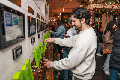 Tap into the self-pour experience! Guests at Tapster enjoy the freedom to pour their own drinks, exploring a variety of craft beers, wines, and more in a festive and inviting atmosphere. (PRNewsfoto/Tapster)