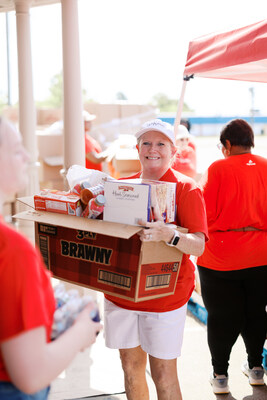 A Church of the Highlands volunteer helps with Convoy of Hope supplies to bring food and essential items to people experiencing food insecurity, financial hardship or crisis.