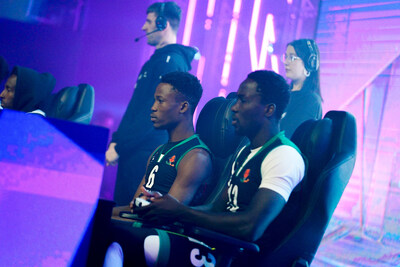 Phygital Athlete Participating in the Digital Side of a Phygital Competition Phygital Athlete Participating in the Digital Side of a Phygital Competition