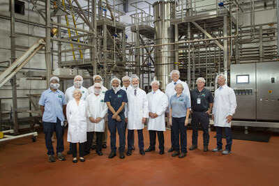 Max Engling Tour: Max Engling, Regional Director for U.S. Senator Jim Banks (center), joins FFP CEO Vince Macciocchi and team members for a tour of the company’s Indianapolis facility, standing in front of the newly installed spinning cone column.