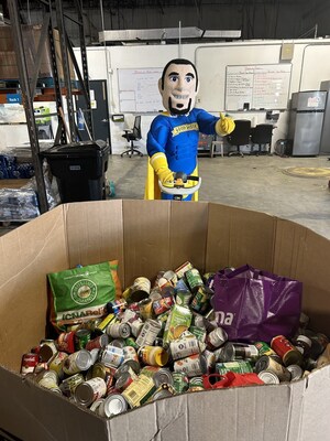 Good Greek Moving & Storage’s mascot, Spero the Hero, delivers a pallet of donated goods as part of the company’s contribution to the Move For Hunger food drive on May 10, 2025, in Tampa, FL. Good Greek transported a total of 10,771 pounds of nonperishables to local food banks and was recognized as Mover of the Month for their outstanding efforts.
