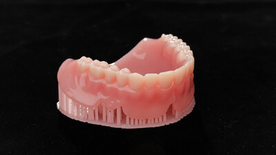 Multi-material denture Multi-material denture