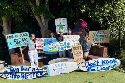 Local student surfers rally with creative signs and surfboards to demand
clean beaches, safer ocean waters, and climate accountability ahead of the
Santa Monica City Council meeting.