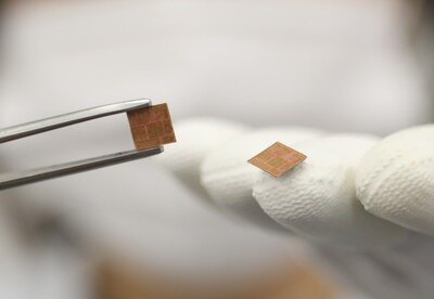 A member of LG Innotek demonstrates an RF-SiP substrate featuring the Cu-Post technology. A member of LG Innotek demonstrates an RF-SiP substrate featuring the Cu-Post technology.