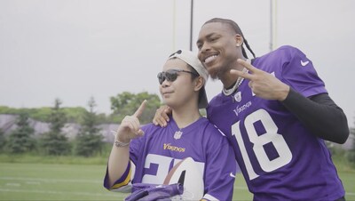Wish kid Aiden, 14, and Minnesota Vikings wide receiver Justin Jefferson after practice. (Credit: ESPN)