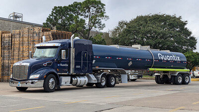 A Quantix Liquid truck sits parked