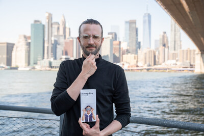 A Steve Jobs lookalike showcases the iSleep Pro kit - a tongue-in-cheek “technological bedtime breakthrough” promoting device-free kids’ bedrooms.