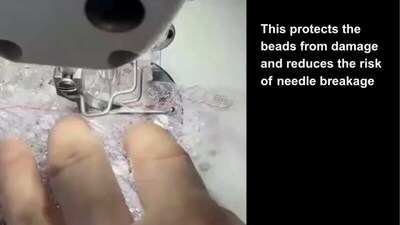 The Beaded Embroidery Seam Presser Foot is a tool developed by SHEIN's CIGM team. It gently moves beads aside allowing the needle to move seamlessly between the beads, making it easier to sew embellished fabrics without damaging beads or sequins and reducing the risk of needle breakage.