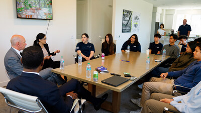 Cedric Bobo, Co-founder and CEO of Project Destined; Adrian Foley, CEO of Brookfield Residential; and Bea Hsu, President, CEO and Board Member, Builders Alliance, speak with Pasadena Unified School District students during a Project Destined learning session.