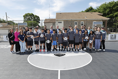 Students and representatives from Genesis, U.S. Soccer Foundation, Cicero District 99, and Drexel Elementary School celebrate the mini-pitch grand opening in Cicero, Ill., on June 3, 2026. (Photo/Genesis)
