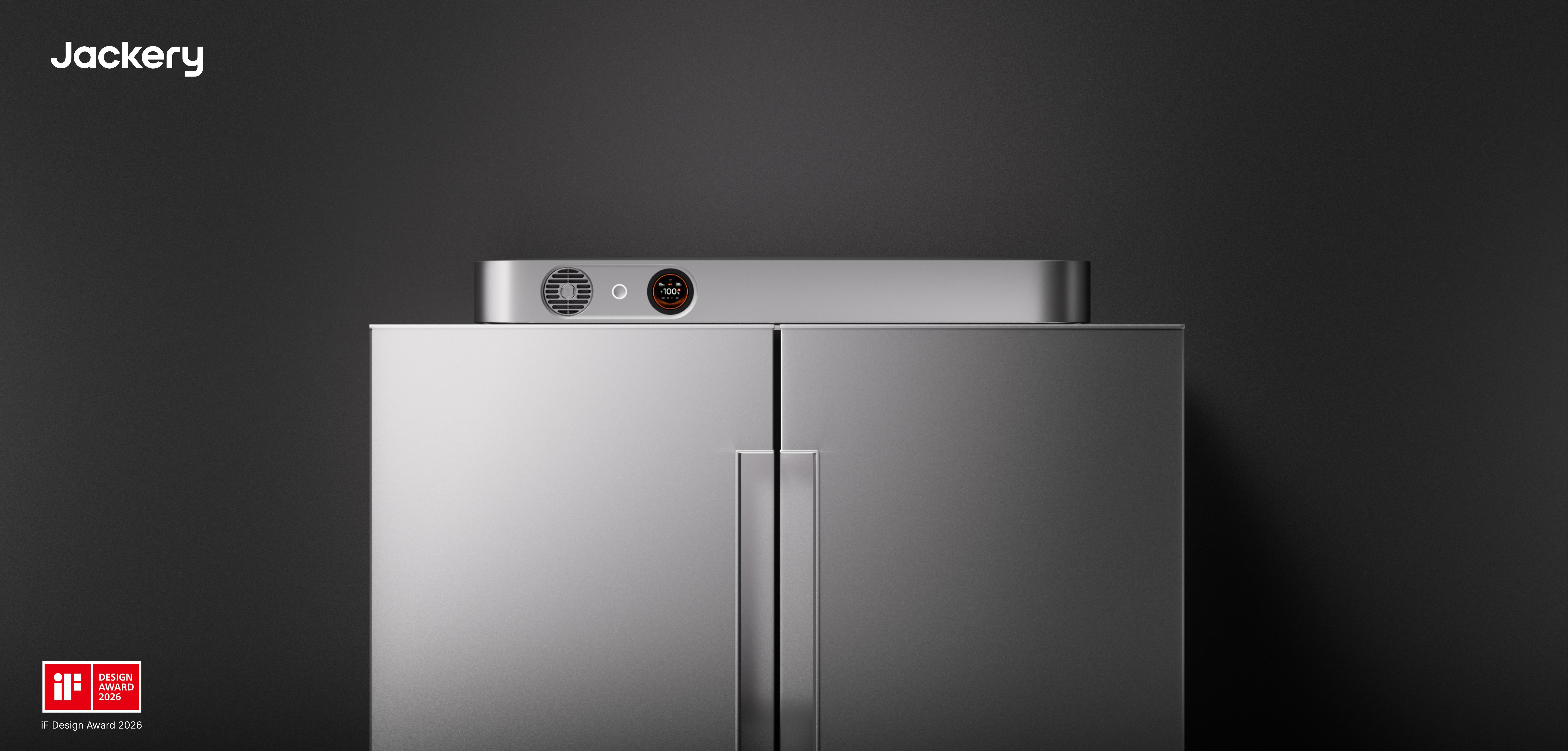 Jackery FridgeGuard power station lying flat on top of a stainless steel refrigerator against a dark background