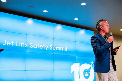 Jame Walker, Executive Chairman, delivers closing remarks at the tenth annual Jet Linx Safety Summit on June 9, 2026. 
