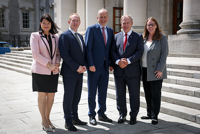 Taoiseach Micheál Martin and Michael Lohan, CEO of IDA Ireland join OpenText to announce creation of 400 new jobs in Cork and Galway as part of €105m investment in expanding agentic AI, sovereign cloud and cybersecurity in Europe. Pictured (L to R): Anne Marie Tierney Le Roux, Head of Technology at IDA Ireland; Michael Lohan CEO of IDA Ireland; Taoiseach Micheál Martin TD; Thomas Jenkins, Chairman of OpenText; and Shannon Bell, Chief Digital Officer & Chief Information Officer of OpenText. 
