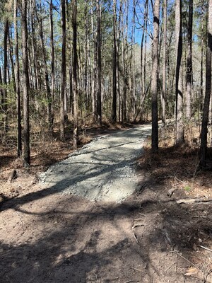 A 2025 Polaris Fund for Outdoor Recreation grant supported initial projects at Land Between the Lakes Forest in the Turkey Bay OHV Area, Kentucky including, a new paved entrance turn lane, striped traffic lanes, speed bump and safety signage installation, resurfaced parking areas, and expanded overflow camping and day-use zones.
