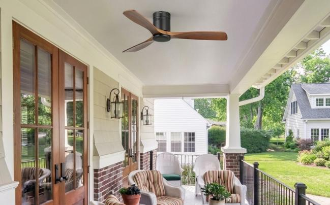 Modern outdoor ceiling fan with solid wood blades providing quiet airflow for patios, porches, gazebos, and outdoor living spaces