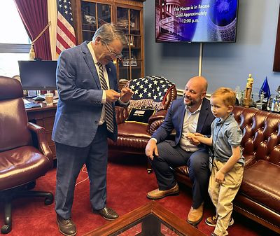 U.S. Representative Gus Bilirakis spends time with Michael Hartnett and his 7-year-old son, Mikey, during a meeting on Capitol Hill June 4, 2026.
