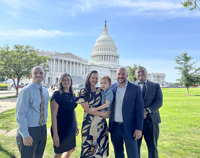 BayCare Federal Government Relations Manager John Learn, St. Joseph’s Children’s Hospital President Sarah Naumowich, Becca, Mikey and Michael Hartnett, and BayCare Government Relations Director Jason Rodriguez in front of the U.S. Capitol on June 4, 2026.