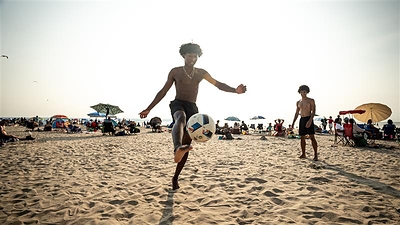 Visitors enjoying Wasaga Beach.