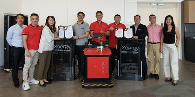 Representatives from Xnergy and UL Solutions commemorating the successful certifications milestone.