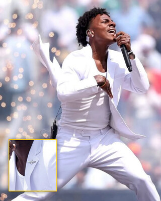 iShowSpeed performs at the World Cup Final on July 19, 2026, wearing the white BARABAS Endless Brushed Cotton Suit and the brand's Faravahar lapel pin.