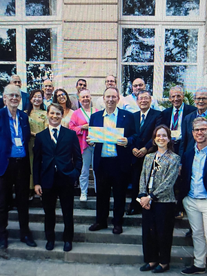 PARIS, FRANCE (Sept 4, 2026): Cuprum Metals Founder and CEO, Roger Pettman (Center), accepting the Grand Prix Scale-Up Award