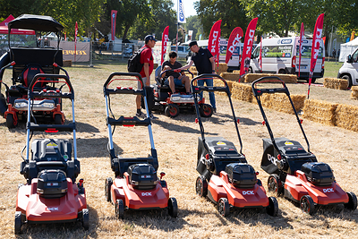 Visitors test DCK's ride-on mowers in the outdoor demo area at Salonvert 2026.