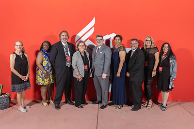 University of Phoenix honored its 2026 Faculty of the Year recipients during a ceremony Sept. 19, 2026, in Phoenix. Pictured, from left, are Faculty of the Year honorees Debra Sandberg, Nita Magee, Mel Waterhouse, Karen Diggs, Scott McCalla, Valerie Merriwether, Brett Novick, Kimberly Mahr and Gina Coffaro.