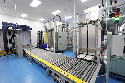Automatic ice Palletizers with conveyor to automatic shrink wrap machine and loaded directly into the freezer.