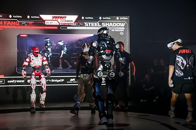 Muay Thai, MMA, boxing and Ninja Kungfu fighters wore body sensors to control lightweight Unitree G1 and heavyweight EngineAI T800 humanoids in real time, the first public demonstration of ARC's pilot-avatar vision for the humanoid age. Muay Thai, MMA, boxing and Ninja Kungfu fighters wore body sensors to control lightweight Unitree G1 and heavyweight EngineAI T800 humanoids in real time, the first public demonstration of ARC's pilot-avatar vision for the humanoid age.