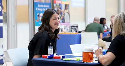 A student interviews at the Fall Education Interview Day event in Auburn University's College of Education Building.