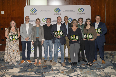 John Hamlin, Cabinetworks Group’s Independence plant manager, with other awardees at SEDCOR’s annual awards and membership meeting on Sept. 30