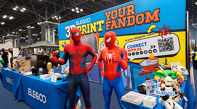 A Spider-Man Cosplayer (left) stands alongside a 3D printed Spider-Man (right) A Spider-Man Cosplayer (left) stands alongside a 3D printed Spider-Man (right)
