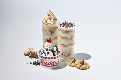 Freddy's is partnering with The Hershey Company for three new limited-time offers starting Nov. 4, 2026: HEATH Caramel Cheesecake Concrete, Peanut Butter Blossom Cookie Concrete and HERSHEY'S Snowfall Sundae.