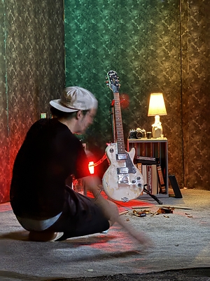 Grunge director Rene Rivas makes final adjustments on the studio set