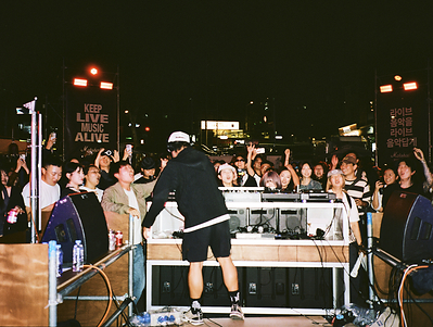 A crowd gathers for live music at Marshall's “LIVE FROM YEONNAM : HYUKOH” event in Seoul's Yeonnam-dong neighborhood, bringing artists, grassroots venues and local music communities together.