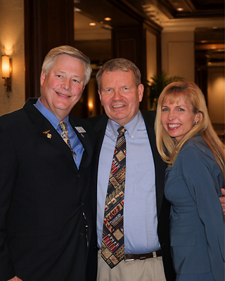 From left, Robert H. Gregg II, DDS, Founder, President and Chairman of the Board of Millennium Dental Technologies; Professor Raymond A. Yukna, DMD, MS; and Dawn M. Gregg, DDS, Training Director of the IALD and Vice President of Operations at Millennium Dental Technologies.