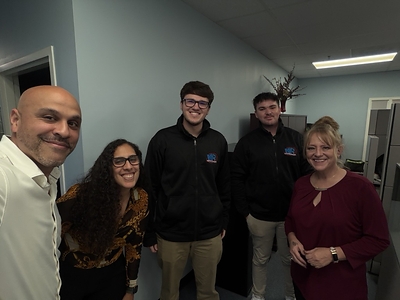 Network Brainiacs leadership with members of the Frederick, Maryland, team following the company’s acquisition of Computer Enhancement Systems, Inc.