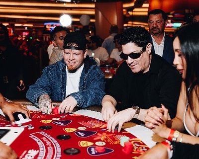 Luke Taleno (left), a Cuban-born rapper raised in Hialeah and an “America’s Got Talent” Golden Buzzer recipient and semifinalist, and GRAMMY-nominated salsa star Frankie Negron join guests at the blackjack table during the launch of Zona de Fuego at Seminole Hard Rock Hotel & Casino Hollywood on Oct. 9, 2026 Luke Taleno (left), a Cuban-born rapper raised in Hialeah and an “America’s Got Talent” Golden Buzzer recipient and semifinalist, and GRAMMY-nominated salsa star Frankie Negron join guests at the blackjack table during the launch of Zona de Fuego at Seminole Hard Rock Hotel & Casino Hollywood on Oct. 9, 2026