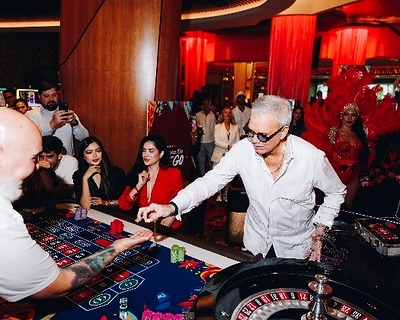 Salsa music legend Willy Chirino led the celebration at the roulette table during the launch of Zona de Fuego at Seminole Hard Rock Hotel & Casino Hollywood on Oct. 9, 2026. Salsa music legend Willy Chirino led the celebration at the roulette table during the launch of Zona de Fuego at Seminole Hard Rock Hotel & Casino Hollywood on Oct. 9, 2026.