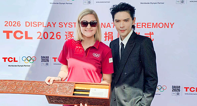 Kirsty Coventry and Jacky Heung attend the donation ceremony
