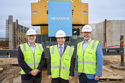 From left: Niowave Vice President of Engineering and Facilities Dino Muzzin, U.S. Secretary of Labor Keith Sonderling, and Niowave President and CCO Matt Burba tour the company’s AP2 facility, currently under construction.