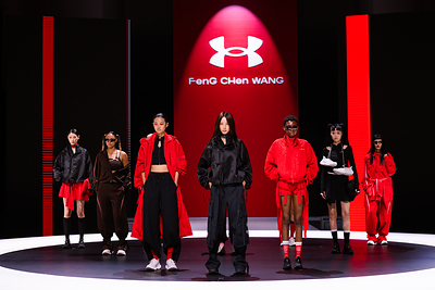 Models showcase the UA x Feng Chen Wang Rebel Daughter collection on stage during the launch event in Shanghai