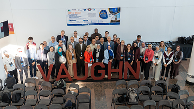 Group photo of researchers and attendees from the conference.