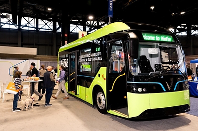 A VinFast electric bus on display at APTA TRANSform & EXPO 2026, showcasing a green mobility solution for U.S. urban transit.